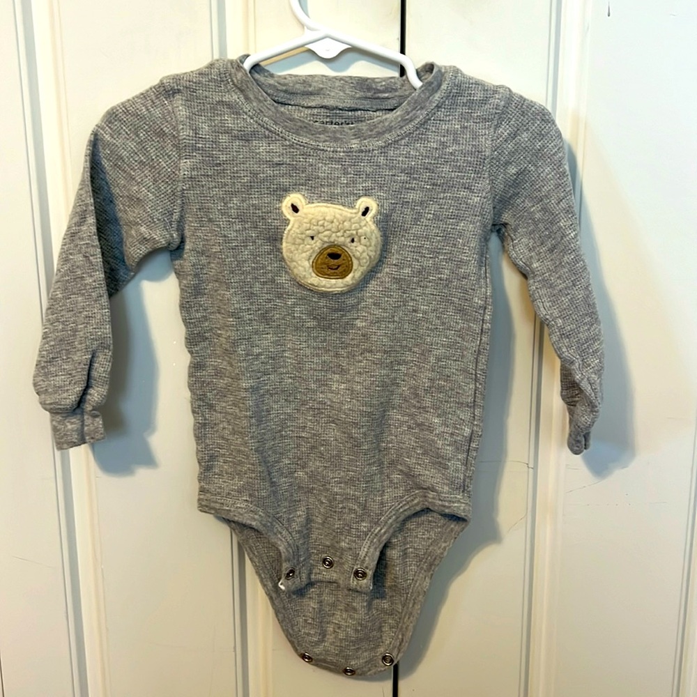 Grey thermal 18 month snap onesie. Has a cute fluffy white bear on the front.